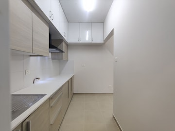 Kitchen in 2 BHK Apartment at Bhartiya Nikoo Homes, Thanisandra Main Road – for Sale