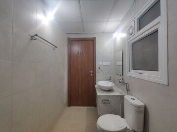 Bathroom in 2 BHK Apartment at Bhartiya Nikoo Homes, Thanisandra Main Road – for Sale