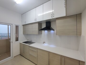 Kitchen in 2 BHK Apartment at Bhartiya Nikoo Homes, Thanisandra Main Road – for Sale