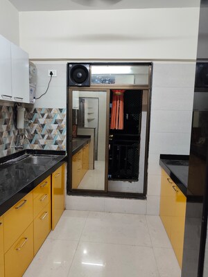 Kitchen in 1 BHK Apartment at Aura Rudra Heights, Nalasopara East – for Sale
