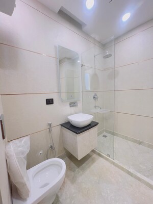 Bathroom in 4 BHK Builder Floor at Auram Floor, South City 2 – for Sale