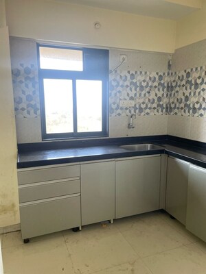 Kitchen in 1 BHK Apartment at Raunak City Phase 2, Kalyan West – for Sale