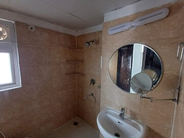 Bathroom in 4 BHK Apartment at Amrapali Crystal Homes, Sector 76 – for Sale