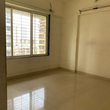 Room in 2 BHK Apartment at Amar Jyoti Tower, Dalvi Nagar – for Sale