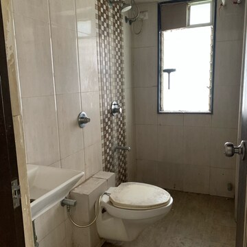 Bathroom in 2 BHK Apartment at Amar Jyoti Tower, Dalvi Nagar – for Sale