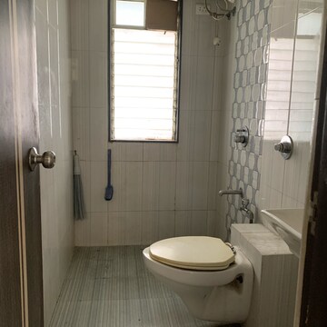 Bathroom in 2 BHK Apartment at Amar Jyoti Tower, Dalvi Nagar – for Sale