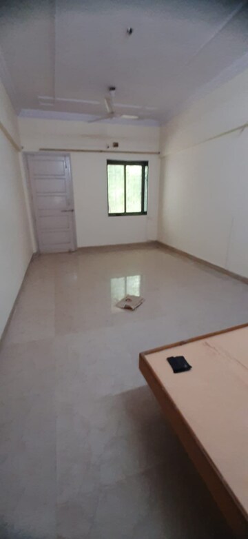 Room in 2 BHK Apartment at New Sarvottam CHS Vile Parle West, Vile Parle West – for Rent