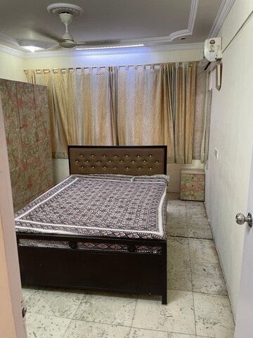 Bedroom in 2 BHK Apartment at New Sarvottam CHS Vile Parle West, Vile Parle West – for Rent