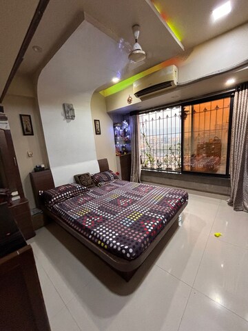 Bedroom in 2 BHK Apartment at Geomatrix Silvercrest, Khanda Colony – for Rent