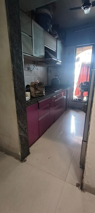 Kitchen in 2 BHK Apartment at Tharwani Rosewood Heights, Kharghar Sector 10 – for Rent