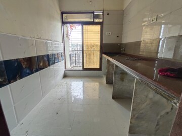 Kitchen in 2 BHK Apartment at Labdhi Astha Anand, Ulwe – for Rent