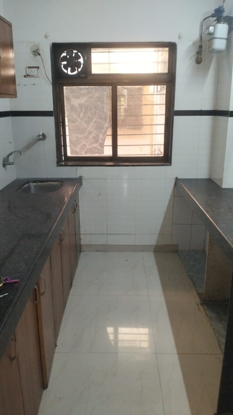 Kitchen, concrete-sai-swar 2 Bedroom 1000 Sq.Ft. Apartment In Kharghar Navi Mumbai 8789703