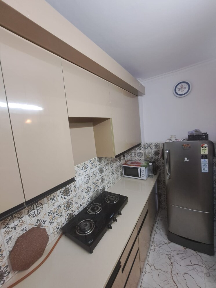 Kitchen, niho-jasmine-scottish-garden 2 Bedroom 1075 Sq.Ft. Apartment In Ahinsa Khand 2 Ghaziabad 8789740