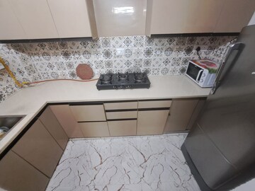 Kitchen in 2 BHK Apartment at Niho Jasmine Scottish Garden, Ahinsa Khand 2 – for Rent