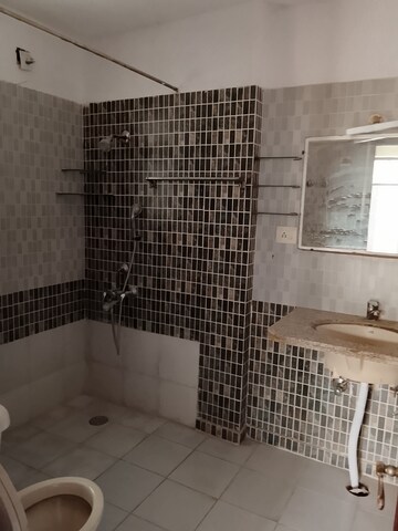 Bathroom in 3 BHK Apartment at Amrapali Royal, Vaibhav Khand – for Rent