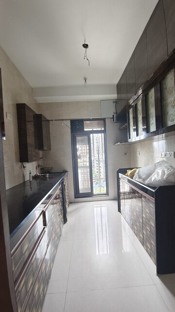 Kitchen in 2 BHK Apartment at Abhiram CHS, Kandivali West – for Rent