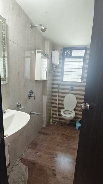 Bathroom in 2 BHK Apartment at Abhiram CHS, Kandivali West – for Rent