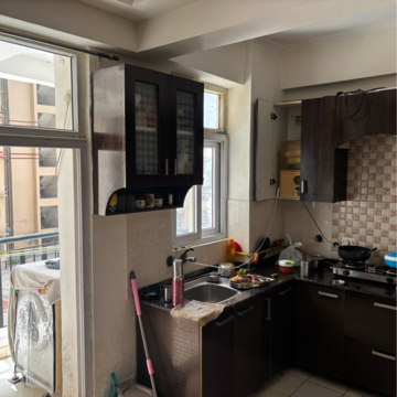 Kitchen in 2.5 BHK Apartment at Amrapali Princely Estate, Sector 76 – for Rent