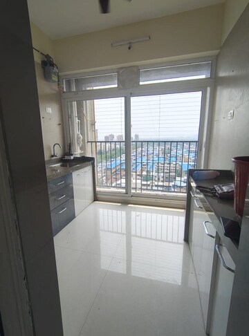 Kitchen in 1.5 BHK Apartment at Shakti Aura, Ghansoli – for Rent