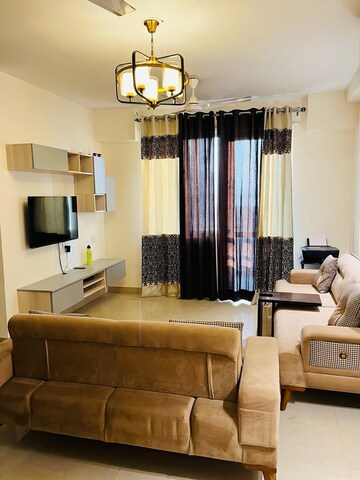 Living Room in 2.5 BHK Apartment at M3M Woodshire, Sector 107 – for Sale