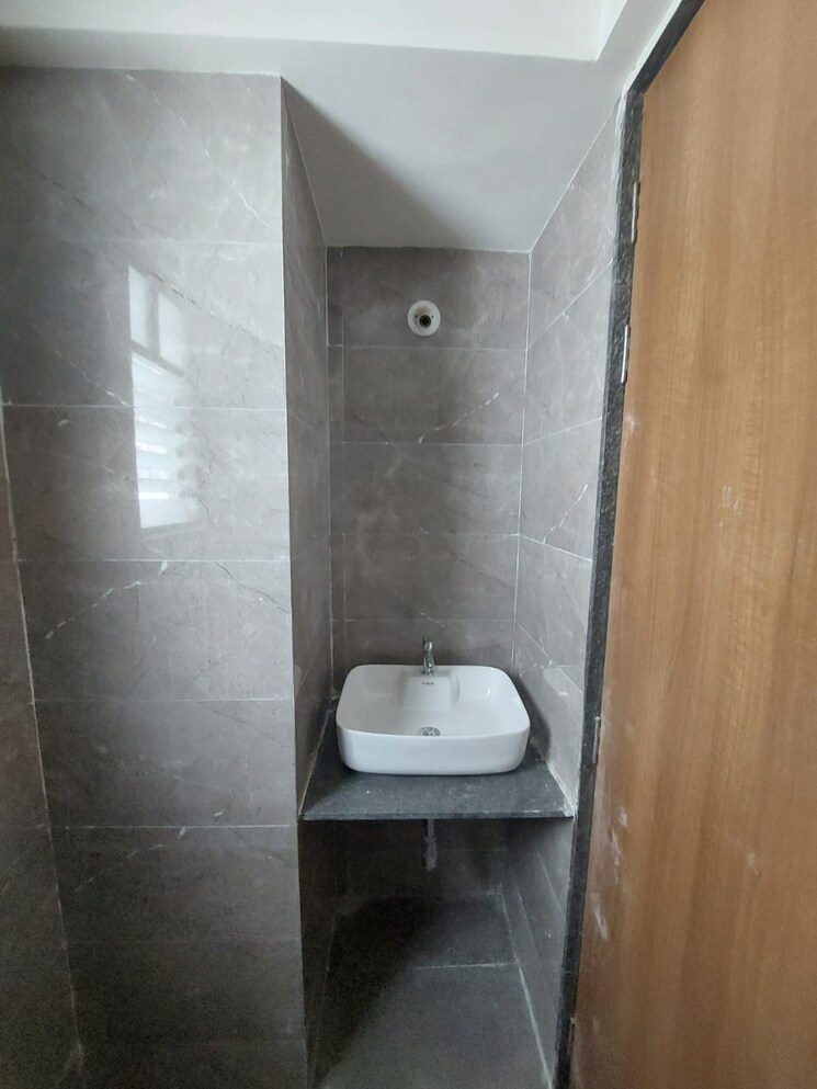 Bathroom, saheel-itrend-life 2 Bedroom 707 Sq.Ft. Apartment In Wakad Pune 8790176