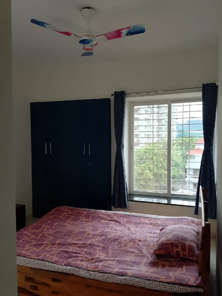 Bedroom, windows-chs 2 Bedroom 959 Sq.Ft. Apartment In Sus Pune 8790206