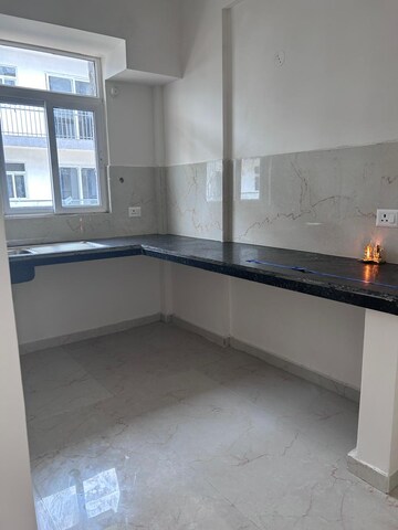 Kitchen in 2 BHK Apartment at Smart World Gems, Sector 89 – for Rent