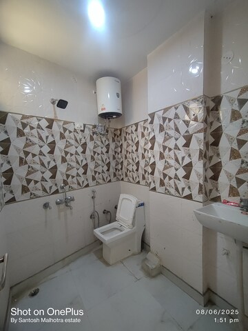 Bathroom in 3 BHK Builder Floor at Dwarka Mor – for Rent