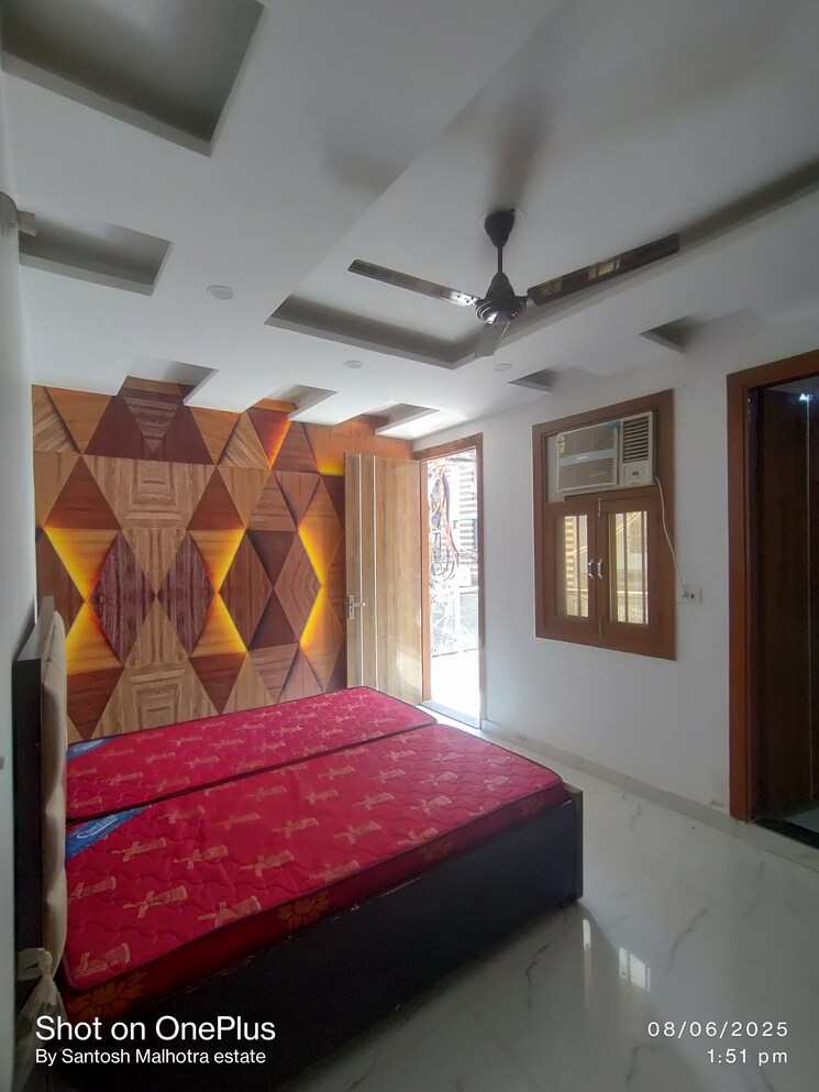 Master Bedroom, dwarka mor 3 Bedroom 100 Sq.Yd. Builder Floor In Dwarka Mor Delhi 8790463
