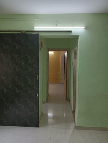 Building Lobby in 1 BHK Apartment at Waghbil – for Rent