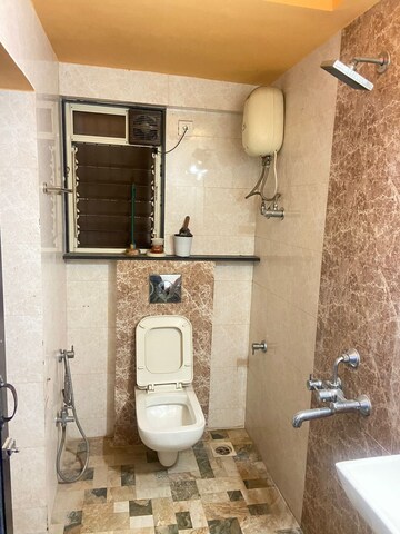 Bathroom in 2 BHK Apartment at Himgiri Lokupvan Phase II CHS Ltd, Vasant Vihar – for Rent
