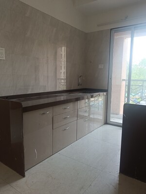 Kitchen in 1.5 BHK Apartment at Parikh Yash Platina, Virar West – for Sale