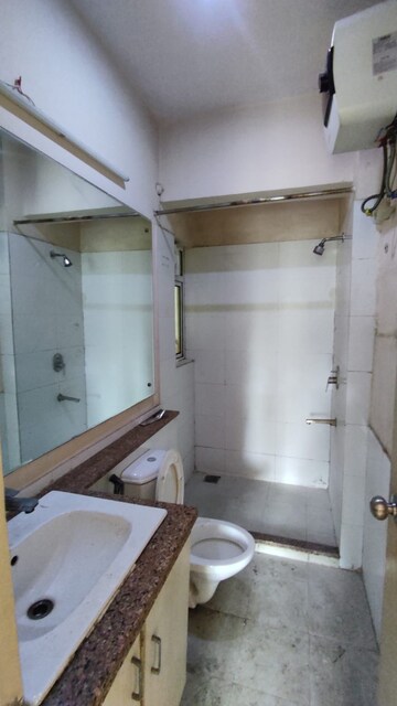 Bathroom in 3 BHK Apartment at Moti Nagar – for Rent