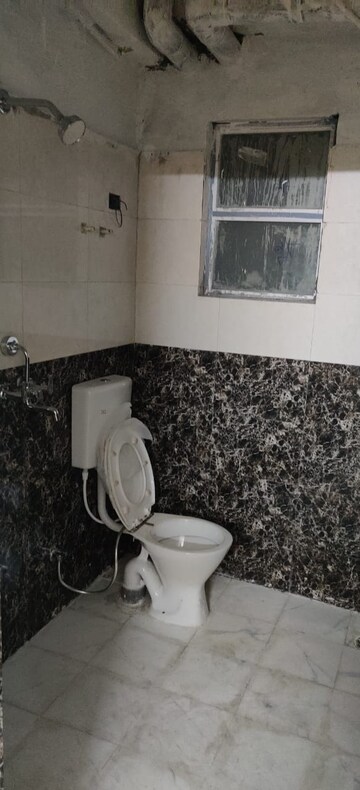 Bathroom in 2 BHK Apartment at Milan Earth, Raj Nagar Extension – for Rent