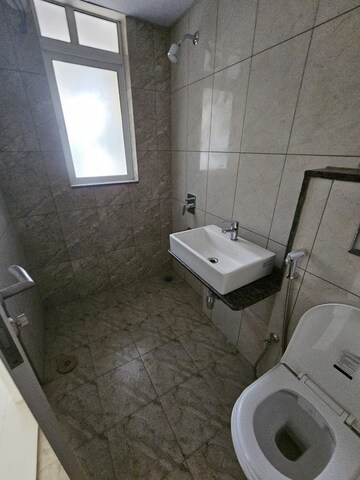 Bathroom in 3 BHK Apartment at Godrej Green Cove, Mahalunge – for Rent