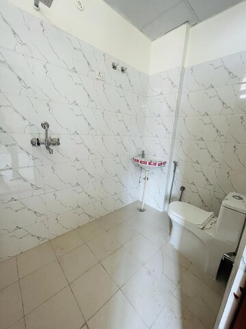 Bathroom in 4 BHK Apartment at Mansarovar Extension – for Rent