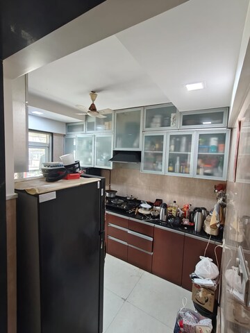 Kitchen in 3 BHK Apartment at Kamala Khandelwal Apartments, Khar West – for Rent
