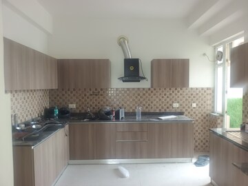 Kitchen in 3 BHK Apartment at Adani M2K Oyster Grande, Sector 102 – for Rent