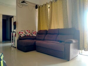 Living Room in 2 BHK Apartment at Rainbow Housing Urban Forest, Mamurdi – for Sale