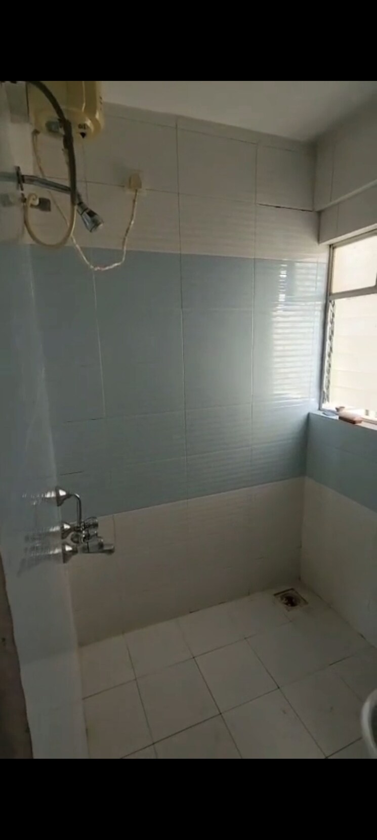 Bathroom, royal-heights-pune 2 Bedroom 900 Sq.Ft. Apartment In Bopodi Pune 8791393