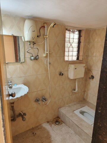 Bathroom in 2 BHK Apartment at Shree Adinath Towers, Borivali East – for Rent