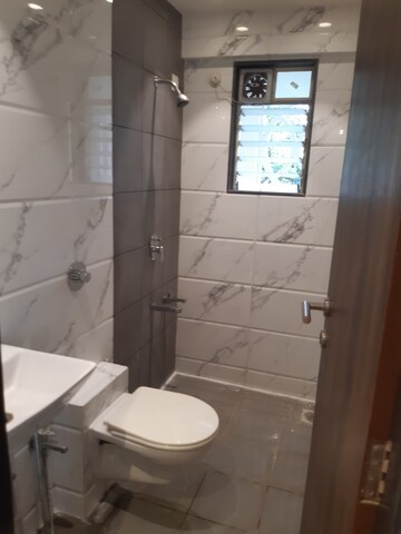 Bathroom in 2 BHK Apartment at Laxmi Narayan CHS Naupada, Naupada – for Rent