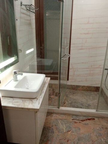 Bathroom in 4 BHK Apartment at Greater Kailash ii – for Rent