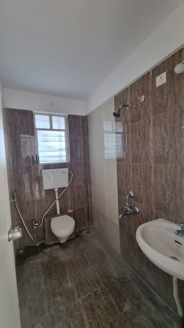 Bathroom in 1 BHK Apartment at Bramha Aangan, Salunkhe Vihar Society – for Rent