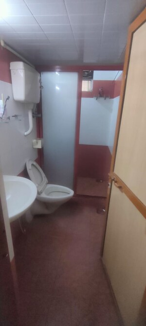 Bathroom in 2 BHK Apartment at Dhoop Chaon Society, Andheri West – for Sale