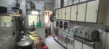 Kitchen in 4 BHK Apartment at Dhoop Chaon Society, Andheri West – for Sale