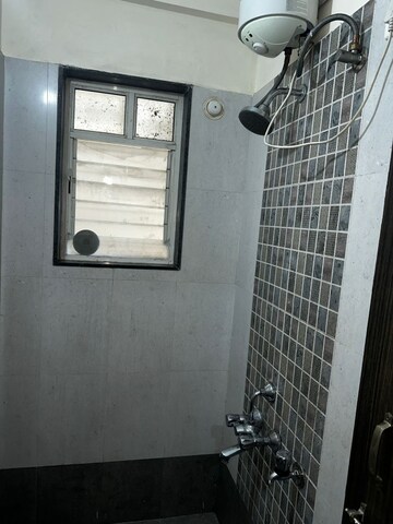 Bathroom in 1 BHK Apartment at Krushi CHS, Gokhalenagar – for Rent