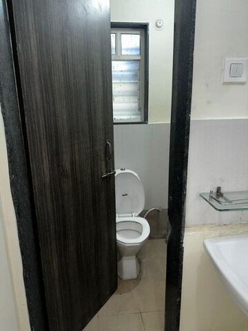Bathroom in 1 BHK Apartment at Krushi CHS, Gokhalenagar – for Rent