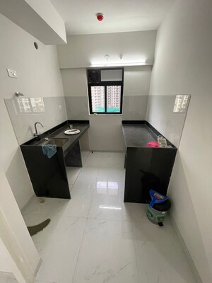 Kitchen in 1 BHK Apartment at Runwal Gardens Phase I, Dombivli East – for Sale