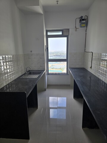 Bathroom in 2 BHK Apartment at Kalpataru Immensa, Kolshet Road – for Rent